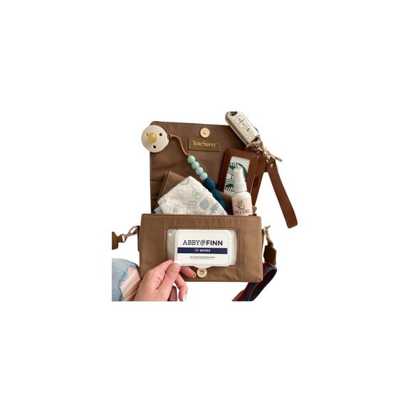 Tote Savvy Change Bag in Fawn. Crossbody with Stripe Strap.
changing pad - Picture 1 of 8